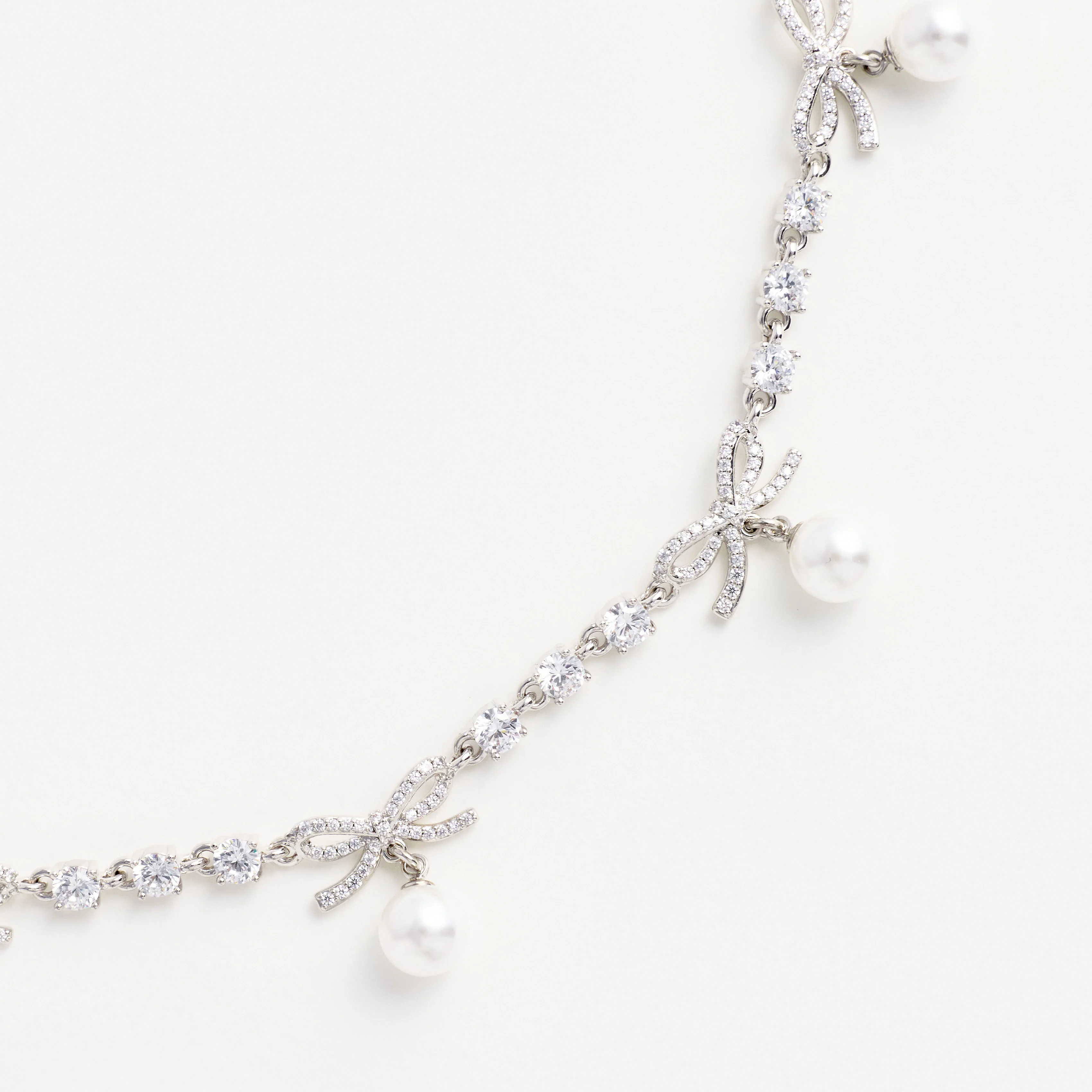 Crystal Bow Pearl Charm Necklace - Image 3